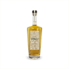 An elegant looking bottle of caramel colored liquid with a label that reads Copalli Barrel Rested Rum against a backdrop of illustrated rainforest flora and fauna.
