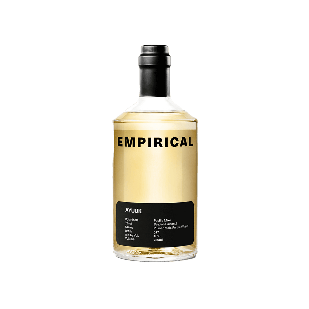 A refined looking minimalistic yellow bottle with the word EMPIRICAL on top in large black sans serif font. Ayuuk is on a black label at the bottom, including a list of ingredients: Botanicals - Pasilla Mixe; Yeast - Belgian Saison 2; Grains - Pilsner Malt, Purple Wheat