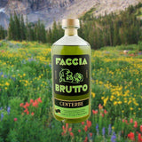 Bottle of Faccia Brutto Centerbe Herbal Liqueur over backdrop of flowers in a meadow.