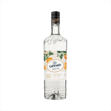 A clear tall bottle of triple sec with a beautifully illustrated label featuring oranges and orange leaves. The label reads 1885 Giffard Triple Sec