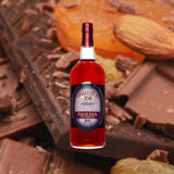 Bottle of Hamilton False Idol 151 Full Strength Rum over backdrop of almonds and chocolate.