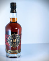 Bottle of High & Wicked Kentucky Straight Rye Whiskey on a light gray background