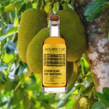 Bottle of Holmes Cay Réunion Island Rum Traditionnel with jackfruit in the background
