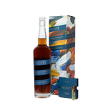 Bottle of Hoste Gold Fashioned and packaging, box it comes in, next to aromatizer.