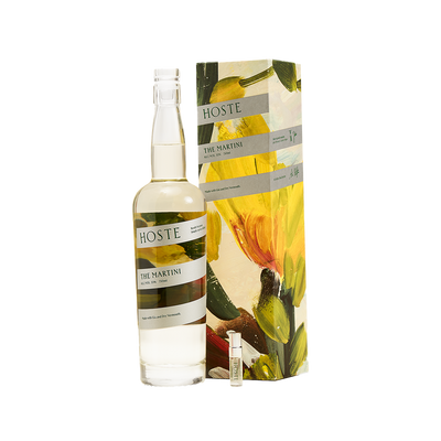 Bottle of Hoste The Martini next to packaging box. product image