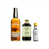 Bottles of Laird's Applejack, Liber & Co. Caramelized Fig Syrup, Angostura Aromatic Bitters.