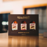 Jimmy Red Bourbon 100ml Gift Pack sitting on a table.