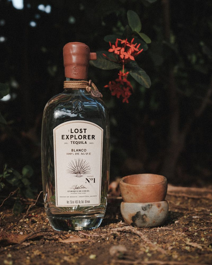 Lost Explorer tequila bottle with a rustic setting
