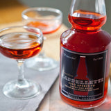 Bottle and glasses of Cappelletti with a blurred background