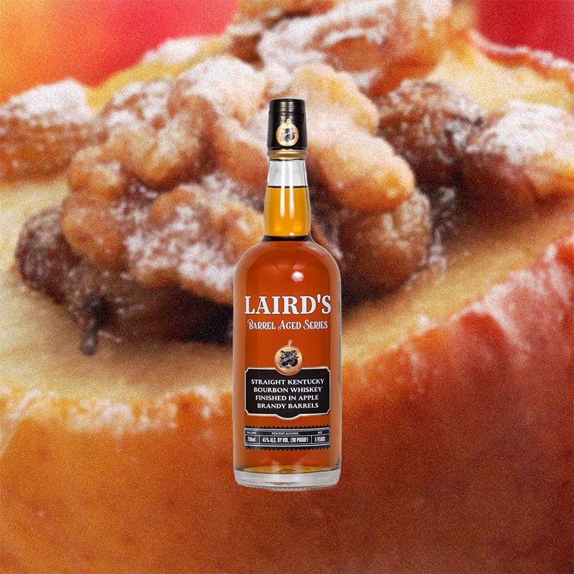 Bottle of Laird's Straight Kentucky Bourbon Whiskey Barrel Finished Series over backdrop image of a Danish up close. 