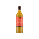 Bottle of fiery ginger syrup with a red label on a white background