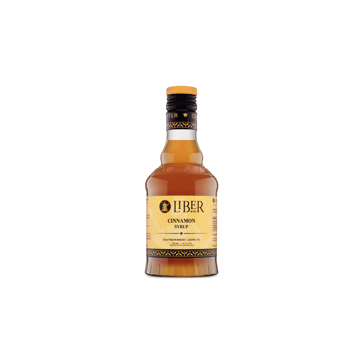 Bottle of Liber Cinnamon Syrup on a white background