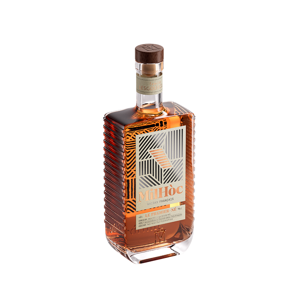 Bottle of Mihoc brandy on a white background