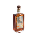 Bottle of Mihoc brandy on a white background
