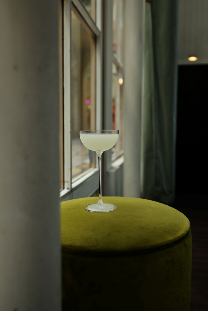 Close-up of a wine glass with a blurred background