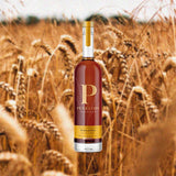 Penelope Wheated Straight Bourbon Whiskey over backdrop image of wheat.
