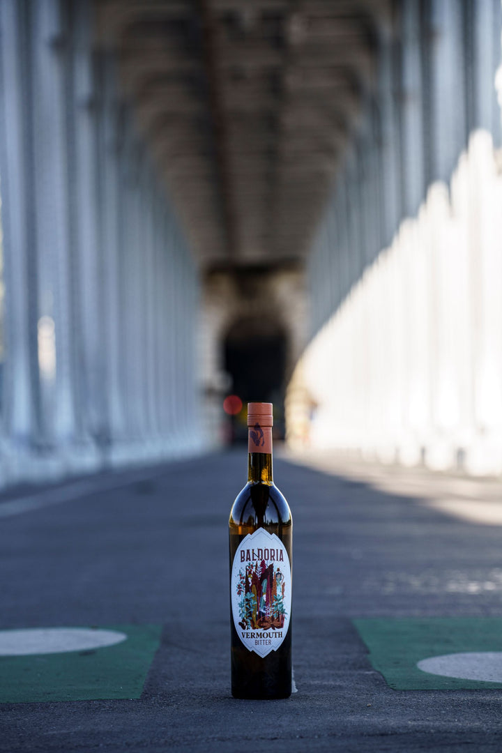 Bottle of Balducci's wine on a bridge with a blurred background