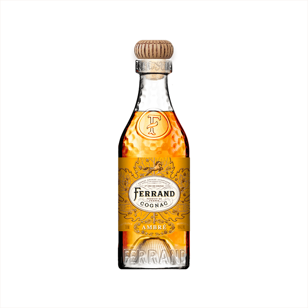 A bottle of Pierre Ferrand Cognac Ambre with a clear amber-colored liquid visible and the brand's logo on the label.