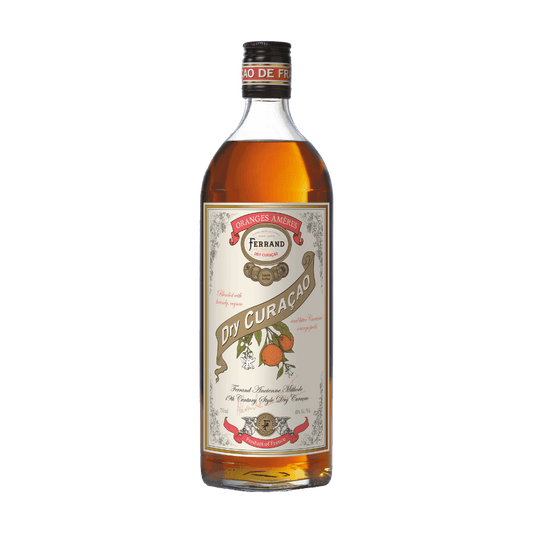 Bottle of Ferrand Dry Curacao liqueur with a visible label on a green background