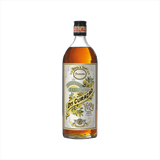 A bottle of yellow liqueur, with an ornate label. It reads Pierre Ferrand Dry Curacao Yuzu. There is a banner above that reads: Yuzu Late Harvest Limited Edition.