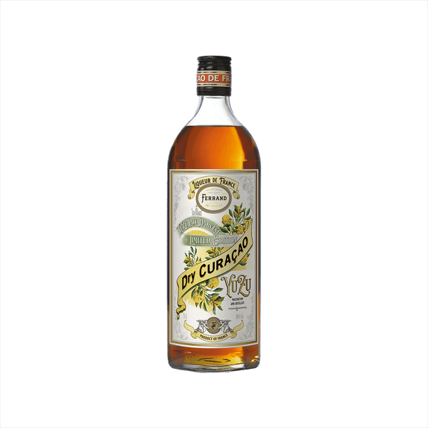 A bottle of yellow liqueur, with an ornate label. It reads Pierre Ferrand Dry Curacao Yuzu. There is a banner above that reads: Yuzu Late Harvest Limited Edition.