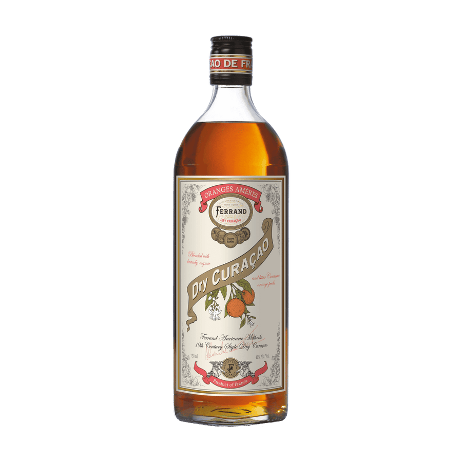 Bottle of Ferrand Dry Curacao liqueur with a visible label on a green background