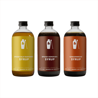 Bottles of Shaker & Spoon Spiced Old Fashioned, Spiced Demerara, and Gingerbread syrups. product image