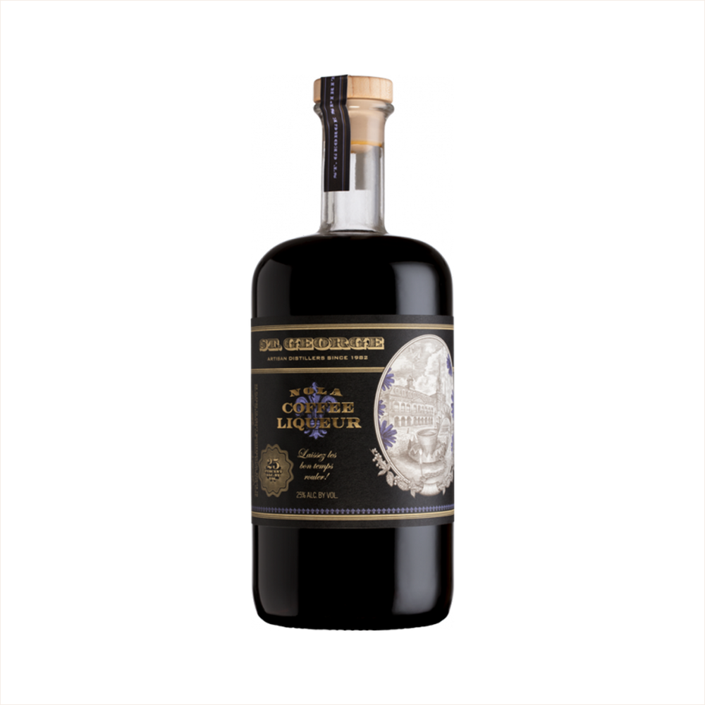 A dark rich liquid in a beautiful, apothecary shaped bottle. The label reads NOLA Coffee Liqueur. There's a sepia toned illustration of an old style Spanish buildings in an oval emblem on the bottle.