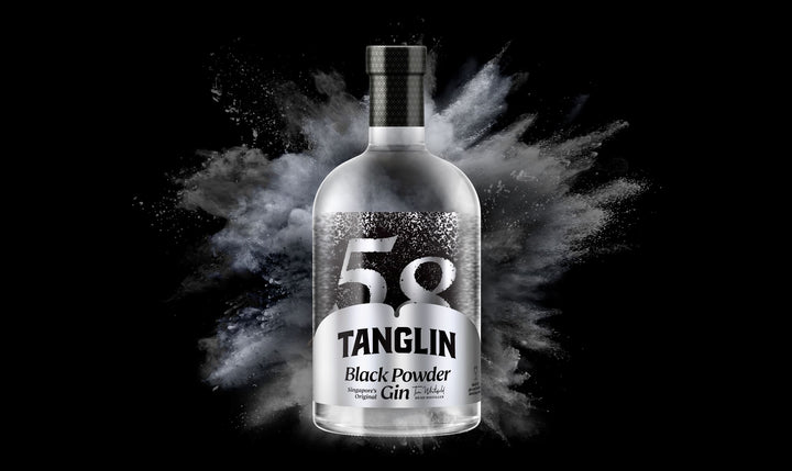 Bottle of Tanglin Black Powder Gin with a black background