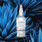 Bottle of Teremana Blanco Tequila over backdrop of blue agave.