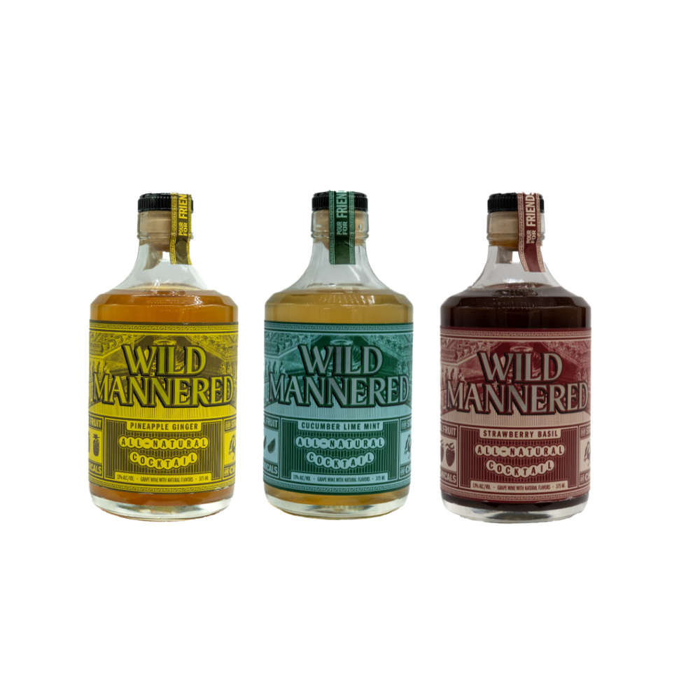 Three bottles of Wild Mannered liquor with different colored labels on a white background