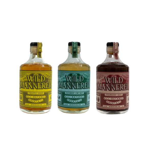 Three bottles of Wild Mannered liquor with different colored labels on a white background