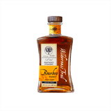 A stout, shapely bottle of appealing amber liquid with a wooden cap. The label is to the left and reads Small Batch Kentucky Straight Bourbon Whiskey Bottled in Bond with Wilderness Trail written down the right in script.