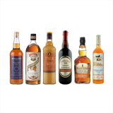 Collection of various whiskey bottles on a white background