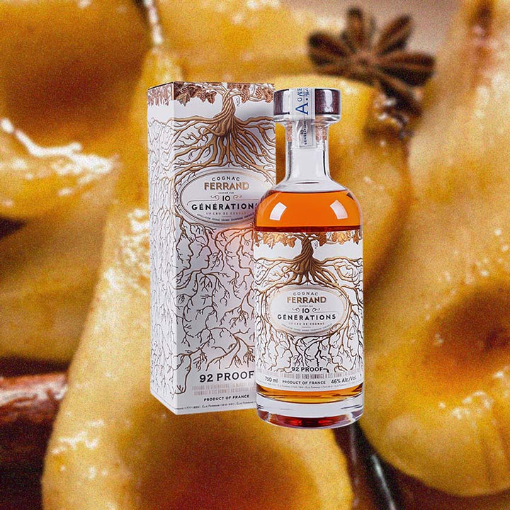 Bottle of Ferrand 10 Generations Cognac over backdrop of candied pears.