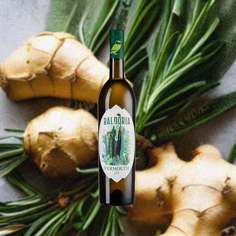 Bottle of Baldoria Dry Vermouth over background image of ginger.