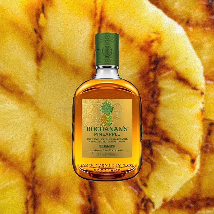 Bottle of Buchanan's Pineapple over background image of Pineapple.
