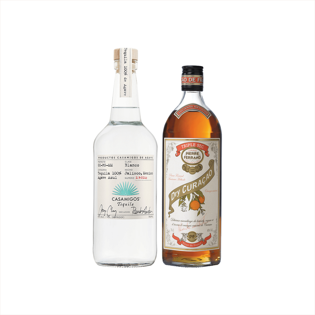 Bottles of Casamigos Blanco Tequila and Pierre Ferrand Dry Curacao.