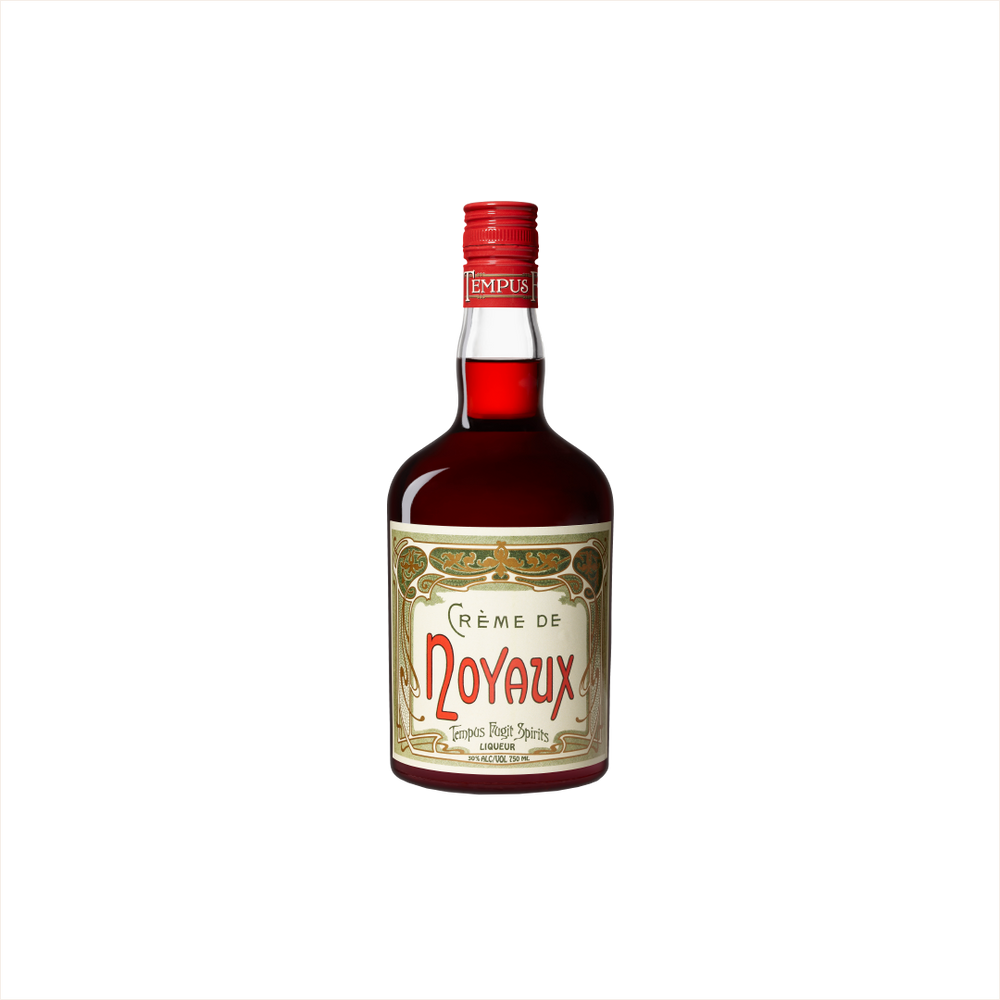 Bottle of Tempus Fugit Creme de Noyaux. A bottle with a bright red cap.
