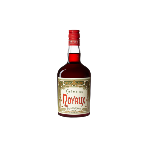 Bottle of Tempus Fugit Creme de Noyaux. A bottle with a bright red cap.
