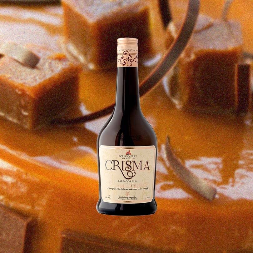 Bottle of Foursquare Crisma Rum Cream over backdrop image of caramel.