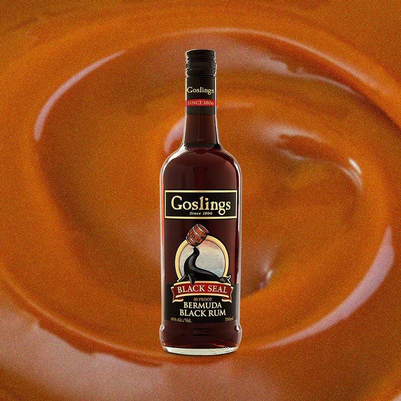 Bottle of Goslings Black Seal Rum over caramel swirl backdrop