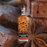 750ml bottle of Heaven's Door Straight Bourbon Whiskey over backdrop of brownies.