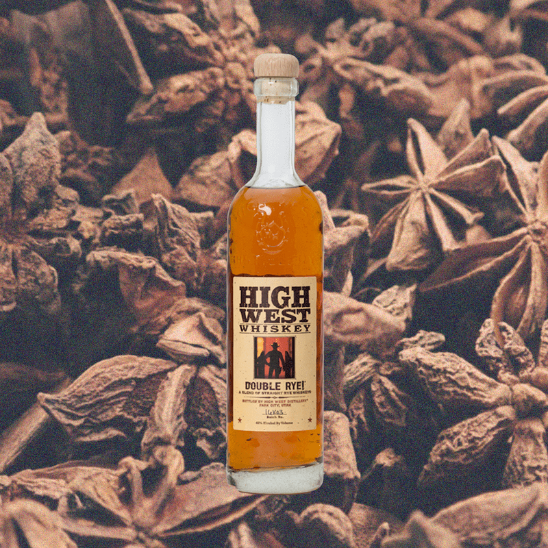 Bottle of High West Double Rye! backdrop of leaves or light brown decor.