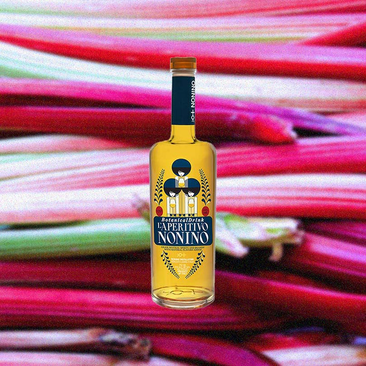 Bottle of Nonino L'Aperitivo Botanical Drink over background image of purple plants.