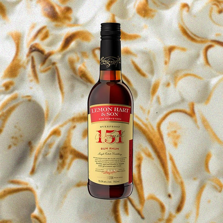 Bottle of Lemon Hart 151 Rum over backdrop of blurred marshmellow.
