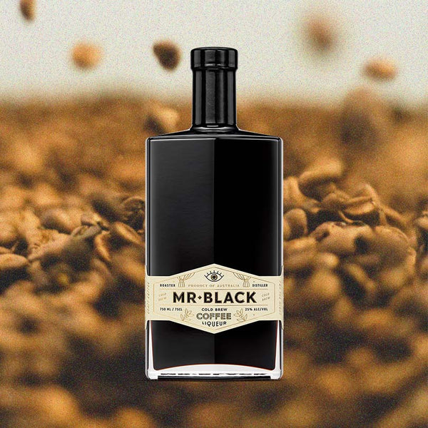 Image of Mr Black Cold Brew Coffee Liqueur overlaid on an image of Arabica beans.  Each bottle contains arabica coffee roasted from beans from the top growing regions of the world.