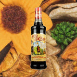 Bottle of Paolucci Amaro CioCiaro. Backdrop of dried flowers.