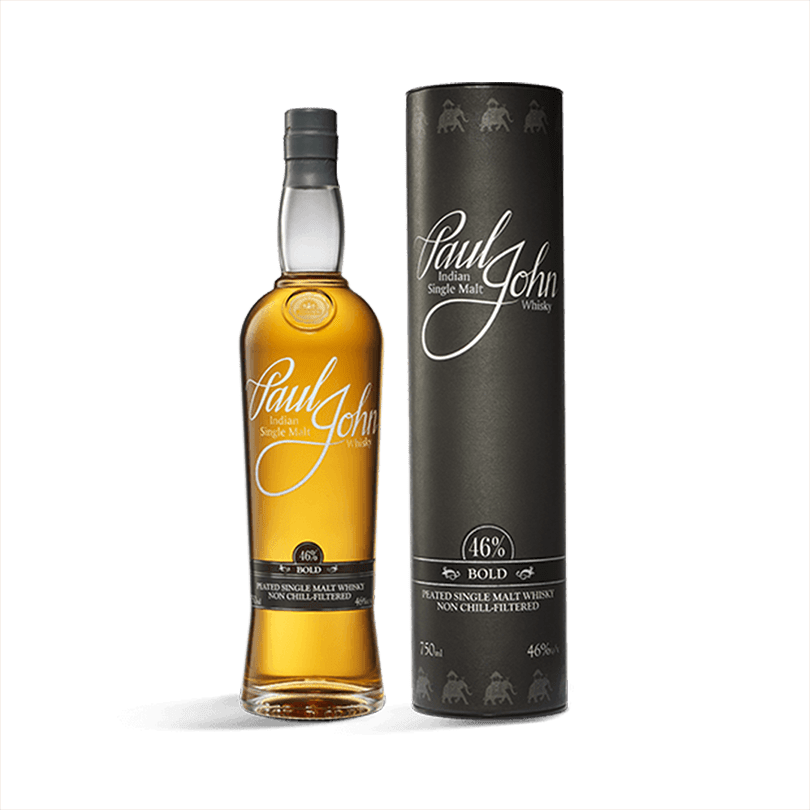 Bottle of Paul John Bold Whisky next to a package which the bottle would go in.