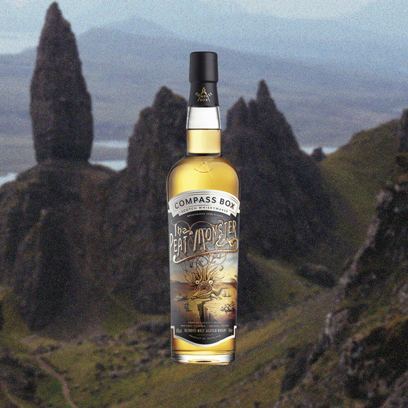 Compass Box Peat Monster Bottle over faded background of mountains and valleys